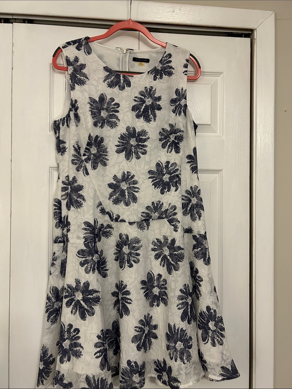 Sleeveless White Dress with Navy Floral Print by